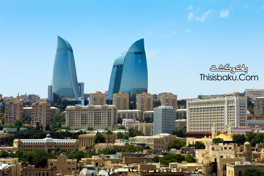 Baku, Azerbaijan - June.06.2012: City and the Flame Towers appearance from maiden tower in June.06.2012 Old and new city buildings can be seen during day. Also new modern buildings Flame towers are on the backside. Flame towers are biggest and modern residential, hotel and business complex in Baku, Azerbaijan.